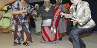 15 Ocotber 2006. South Africa. Cape Town mayor, Helen Zille getting down with the elders of the  "Age in Action" women to celebrate their  50th birthday.