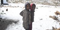 Two boys stand in the snow on a farm in Rhodes, Eastern Cape, South Africa, 12 June 2020. The Western and Eastern Cape were recently blanketed with the first South African snowfall for 2020. (Photo: Shiraaz Mohamed)