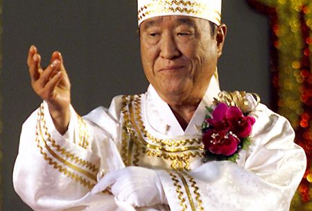 The Moonie church loses its grip on doctrine, money and leadership in slo-mo