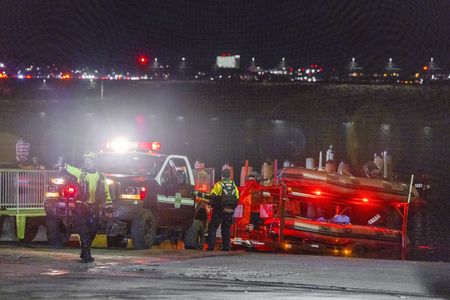 Many feared dead after passenger jet and helicopter collide, crash into Washington river