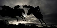 WINCANTON, ENGLAND - NOVEMBER 18: A general view as runners clear the water jump during The Wincanton Supporting Wincanton Town Youth FC Mares' Novices' Handicap Chase at Wincanton Racecourse on November 18, 2021 in Wincanton, England. (Photo by Alan Crowhurst/Getty Images)