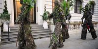 Stilt-walkers dressed as tree-spirit "Ents" move into position as environmental campaign groups demonstrate outside the Department of Energy Security and Net Zero, as they call for the closure of the Drax power station, on December 02, 2024 in London, England. Climate demonstrators are calling for an end to government subsidies for the Drax Power Plant in North Yorkshire, which generates electricity by burning wood pellets sourced from trees in North America. (Photo by Leon Neal/Getty Images)