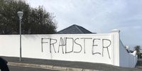 Graffiti on Markus Jooste's Hermanus house, 19 March 2019. (Photo: Twitter / @Gina_and_tonic)