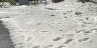 Massive hailstorm hits Secunda, causing damage to several buildings and houses. Photo: Rassie Erasmus<br>