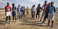 Some of the players pose for an image with their assistant coach Ngqubuka Malefetsane (yellow jersey, centre of image). Malefetsane dreams of playing professional rugby and wants the whole of South Africa to watch him play. (Photo: Shiraaz Mohamed)