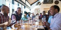 Wine buffs Wanda Magoda and Amos Sobashe with Aubrey Ngcungama at a BLACC tasting. (Photo: Claire Gunn)<br>