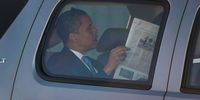 ALBUQUERQUE, NM - OCTOBER 26: Democratic presidential nominee U.S. Sen. Barack Obama (D-IL) reads a newspaper as he arrives at Albuquerque International Sunport airport October 26, 2008 in Albuquerque, New Mexico. Obama continues to campaign against Republican presidential nominee Sen. John McCain (R-AZ) as Election Day draws near.  (Photo by Joe Raedle/Getty Images)