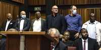 Kuben Moodley, Eric Wood, Siyabonga Gama, Garry Pita, Daniel Roy, Phetolo Ramosebudi and other Transnet officials appear at Palm Ridge Specialised Crimes Court on October 14, 2022 in Palm Ridge, South Africa. The suspects were arrested on Transnet related  R398.4 million fraud and corruption charges. (Photo: Gallo Images / OJ Koloti)