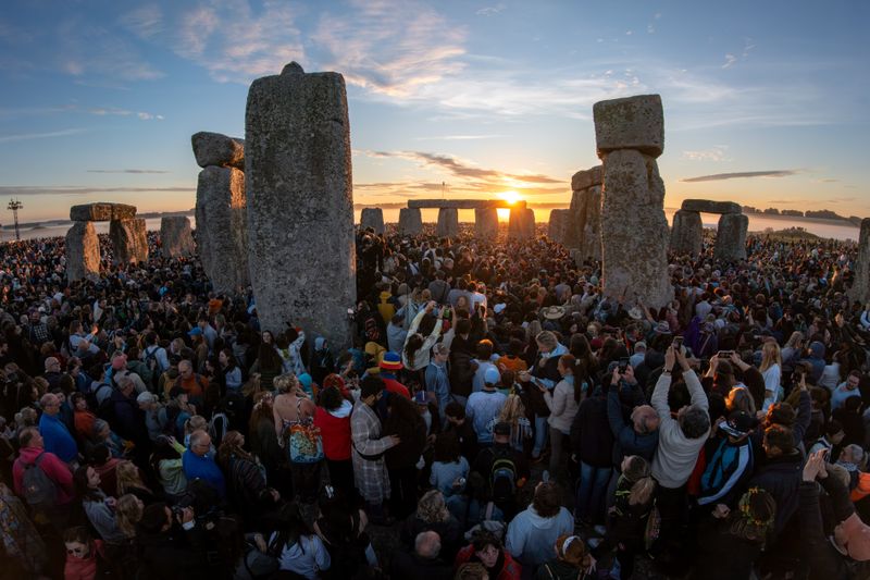 Where the sun stands still, solstice crowds gather at stonehenge