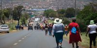 Protestors walking back home from the Lenasia South Civic Centre after delivering a memorandum to Johannesburg Water, demanding access to clean running water from communal taps, on 2 December 2024. (Photo: Julia Evans)