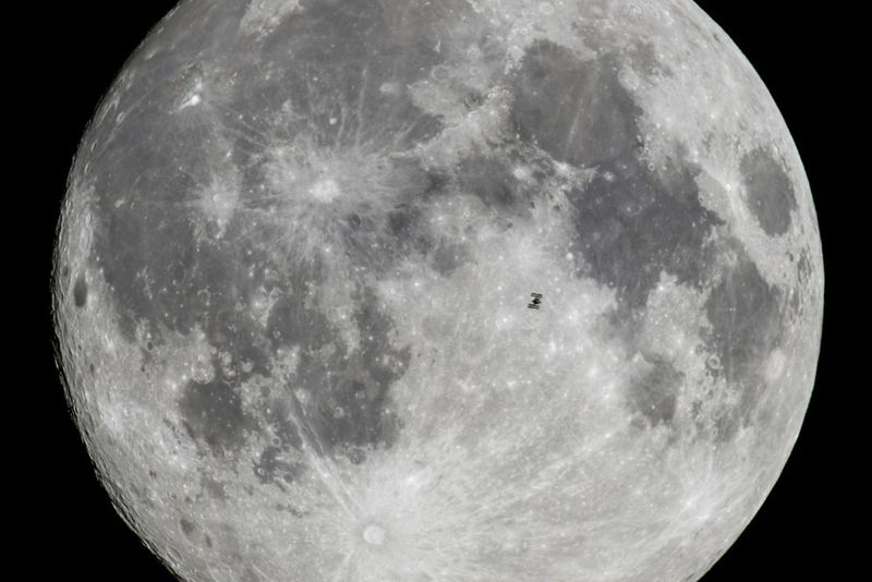 International Space Station captured in the foreground of the Moon