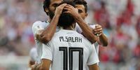 Mohamed Salah (C) of Egypt celebrates with team mates after scoring the 1-0 lead during the FIFA World Cup 2018 group A preliminary round soccer match between Saudi Arabia and Egypt in Volgograd, Russia, 25 June 2018.  EPA-EFE/ZURAB KURTSIKIDZE  <br>(RESTRICTIONS APPLY: Editorial Use Only, not used in association with any commercial entity - Images must not be used in any form of alert service or push service of any kind including via mobile alert services, downloads to mobile devices or MMS messaging - Images must appear as still images and must not emulate match action video footage - No alteration is made to, and no text or image is superimposed over, any published image which: (a) intentionally obscures or removes a sponsor identification image; or (b) adds or overlays the commercial identification of any third party which is not officially associated with the FIFA World Cup)  EPA-EFE/ZURAB KURTSIKIDZE   EDITORIAL USE ONLY