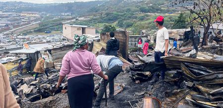 Relief efforts continue after Kennedy Road informal settlement fire kills two, displaces more than 150
