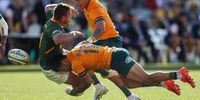 Handre Pollard of the Springboks is tackled by Hunter Paisami of the Wallabies during the Rugby Championship Test match between the Australian Wallabies and the South African Springboks at Adelaide Oval in Adelaide, Australia, August 27, 2022. (Photo: EPA-EFE/Matt Turner)