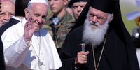 Pope Francis is met by Archbishop of Athens and All Greece, Ieronimos II as he arrives on the Greek island of Lesbos at Mytilene airport on April 16, 2016 in Mytilene, Lesbos, Greece. Pope Francis will visit migrants at the Moria camp on the Greek island of Lesbos along with Greek Orthodox Ecumenical Patriarch Bartholomew I and Archbishop of Athens and All Greece, Ieronimos II.  (Photo by Milos Bicanski/Getty Images)