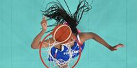 PARIS, FRANCE - AUGUST 07: (EDITORS NOTE: Image was captured using a remote camera positioned above the field of play) Iliana Rupert #12 of Team France shoots a layup during a Women's basketball quarterfinal game between Team France and Team Germany on day twelve of the Olympic Games Paris 2024 at Bercy Arena on August 07, 2024 in Paris, France. (Photo by Pool/Getty Images)