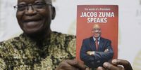 Former president Jacob Zuma with his book, ‘Jacob Zuma Speaks’. (Photo: Mandla Langa)