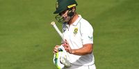 Dean Elgar of South Africa leaves the field after being dismissed during day one of the Tour Match between Australia A and South Africa at Allan Border Field on 9 December, 2022 in Brisbane, Australia. (Photo: Albert Perez/Getty Images)