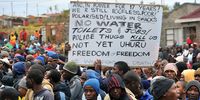 Protestors hold up a poster in Ficksburg, South Africa on 13 May 2011 where residents took to the streets in protest calling for the mayor to step down. (Photo: Gallo Images / Foto24 / Felix Dlangamandla)