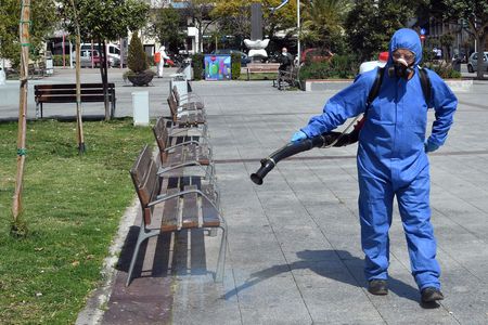 Greece imposes 14-day quarantine on new arrivals, shuts retail stores