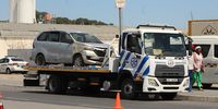 A Toyota Avanza is impounded by City of Cape Town traffic officials on Wednesday. (Photo: Velani Ludidi)