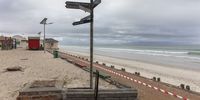 A general view of the empty Muizenberg Beach in Cape Town, South Africa, 25 March 2020. After mandating the closure of all beaches throughout the country, the South African government announced a nationwide 21-day total lockdown, starting at midnight on 26 March, in a bid to slow down the spread of the ongoing pandemic of the COVID-19 disease caused by the SARS-CoV-2 coronavirus.  (Photo: EPA-EFE/NIC BOTHMA)