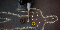  People participate in a sit-in to launch the campaign 'My family does not know that I was a false positive', during the commemoration of the International Day of Victims of Enforced Disappearances, in Medellín, Colombia, 31 August 2023.  EPA-EFE/Luis Eduardo Noriega A.