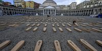 A view of a 'cemetery' with 500 cardboard coffins, symbolizing work-related deaths, placed in Piazza Plebiscito square in Naples, southern Italy, 24 April 2024. The provocative initiative, promoted by the Italian Labour Union (UIL), is part of a 'Zero deaths at work' campaign planned at a territorial level throughout Italy to denounce the 'massacre' of workers. According to the National Institute for Insurance against Accidents at Work (INAIL), Italy has recorded more than a thousand deaths at work throughout 2023.  EPA-EFE/CIRO FUSCO