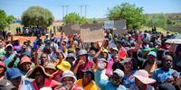 Residents of Phumla Mqashi informal settlement in Lenasia South marched from the Golden Highway to Lenasia South Civic Centre to deliver memorandum to the Mayor City of Johannesburg and Johannesburg Water, demanding access to clean running water from communal taps on 2 December 2024. (Photo: Julia Evans)