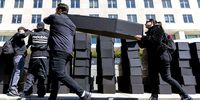 Activist pallbearers stack symbolic coffins to protest against Secretary of State Marco Rubio’s disruptions to Pepfar, outside the State Department in Washington, DC, on 17 April 2025. (Photo: EPA / Shawn Thew)
