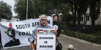 Protesters holding placards and banners gather outside the offices of African Rainbow Minerals (ARM) in Johannesburg, South Africa, 03 April 2025. The demonstrators from the SA BDS Coalition coal embargo campaign protested against the alleged export of coal from South Africa to Israel, denouncing Israeli operations in the Gaza Strip and claim the coal is aiding Israel by fueling the country's electricity supply.  EPA-EFE/KIM LUDBROOK