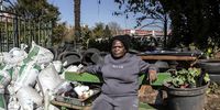 Refiloe Molefe  waiting for transport for the move to Naturena, south of Johannesburg, 5 June 2022.<br>(Photo: Mark Lewis)