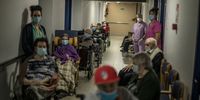 LANGREO, SPAIN - JANUARY 22: Elderly people queue to be vaccinated against covid in a nursing home on January 22, 2021 in Langreo, Spain. The autonomous community of Asturias began administrating the second dose of COVID-19 vaccine, to complement the first phase of the vaccination process that began on December 27, 2020.  (Photo by Manu Brabo/Getty Images)