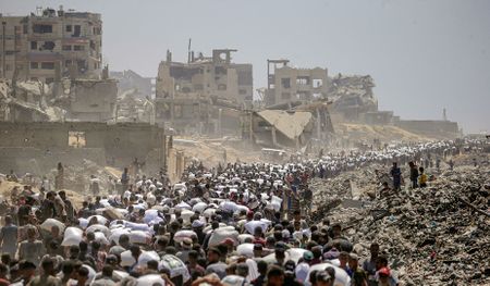 Gazans stream towards wrecked homes as Israeli forces pull back under ceasefire