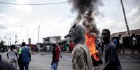 A protestor of the Azimio la Umoja coalition wearing Wolf mask during a nationwide mass protest in Kibera Slum of Nairobi, Kenya on March 20, 2023 in Nairobi, Kenya. Opposition leader and former Prime Minister Raila Odinga called for his supporters to protest today to pressure Kenyan President William Ruto over the cost of living. Odinga has also questioned the results of last year's presidential election. (Photo by Donwilson Odhiambo/Getty Images)