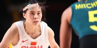 SAITAMA, JAPAN - JULY 30: Siyu Wang #5 of Team China wears a bandage on her head as she defends against Leilani Mitchell #5 of Team Australia during the first half of a Women's Basketball Preliminary Round Group C game on day seven of the Tokyo 2020 Olympic Games at Saitama Super Arena on July 30, 2021 in Saitama, Japan. (Photo by Gregory Shamus/Getty Images)