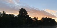Serene sunrise over the Thames River, Oxford, UK. Photographer: Shalendra Misser