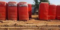 Chemical toilets lined up along the main road at Winnie Mandela informal settlement in Tembisa. (Photo: Tabelo Timse)
