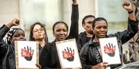 Western Cape government staff and citizens outside the provincial legislature in Wale Street, Cape Town on 5 December 2023 as part of the 16 Days of Activism For No Violence Against Women and Children campaign.  (Photo: Gallo Images / Brenton Geach)