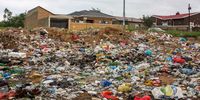 Residents complain that they can't sell their houses  because of the rubbish. (Photo: Tshabalira Lebakeng)