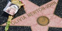 Flowers are placed on Olivia Newton-John's Hollywood Walk of Fame star on August 08, 2022 in Hollywood, California. (Photo: Rodin Eckenroth / Getty Images)
