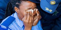 A traffic officer breaks down during the funeral.<br>(Photo:  Donna van der Watt)