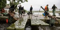 Volunteers deliver humanitarian aid to local residents in the village of Afanasiivka, Mykolaiv region, Ukraine, 12 June 2023, amid floods following the collapse of a major dam. Ukraine has accused Russian forces of destroying a critical dam and hydroelectric power plant on the Dnipro River in the Kherson region along the front line in southern Ukraine on 06 June. The villages of Novovasylivka and Afanasiivka had turned into islands as territories around the Inhulets River in the Mykolaiv region were flooded.  EPA-EFE/STAS KOZLIUK