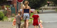 Children in Vrededorp, Johannesburg walk home from a soup kitchen which receives expired food from supermarkets.(Photo Joyrene Kramer)