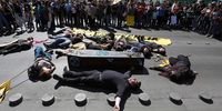 SANTIAGO, CHILE - SEPTEMBER 19: Demonstrators perform during the global climate strike at Plaza Italia on September 20, 2019 in Santiago, Chile. Strikes are being held all around the world to protest against government and business inaction on climate change. This initiative is led by 16-year-old Swedish climate activist Greta Thunberg ahead of the Climate Action Summit to be held on September 23. (Photo by Marcelo Hernandez/Getty Images)