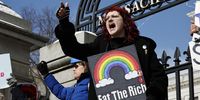 Citizens take part in a nationwide protest on Presidents' Day against the recent agenda of US President Donald Trump, outside the Massachusetts Statehouse in Boston, Massachusetts, USA, 17 February 2025.  EPA-EFE/CJ GUNTHER