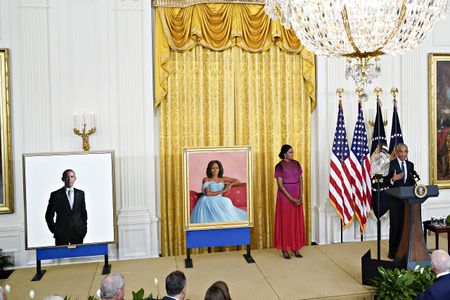 Obamas welcomed back to the White House as President Biden unveils their portraits