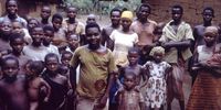 Refugees are shown waiting for food rations at a relief camp in Port Harcourt, Nigeria, during the Nigerian-Biafran civil war. (Photo: Public Health Image Library)