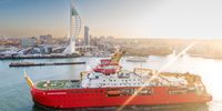 PORTSMOUTH, ENGLAND - NOVEMBER 17: In an aerial view, the RRS Sir David Attenborough arrives to refuel on November 17, 2021 in Portsmouth, England. The RRS Sir David Attenborough arrives in Portsmouth to take on fuel prior to departing the UK for its maiden voyage to Antarctica. The state-of-the-art research vessel will transfer station teams, food, cargo and fuel to British Antarctic Survey's five research stations as well as transporting essential science equipment for studies on unstable glaciers before returning to the UK in June 2022. (Photo by Finnbarr Webster/Getty Images)
