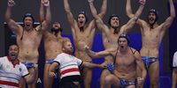 Members of Team Serbia celebrate winning the Men's Water Polo Quarterfinal match between Serbia and Italy on day 10 of the Fukuoka 2023 World Aquatics Championships at Marine Messe Fukuoka Hall B on July 25, 2023 in Fukuoka, Japan. (Photo by Adam Pretty/Getty Images)